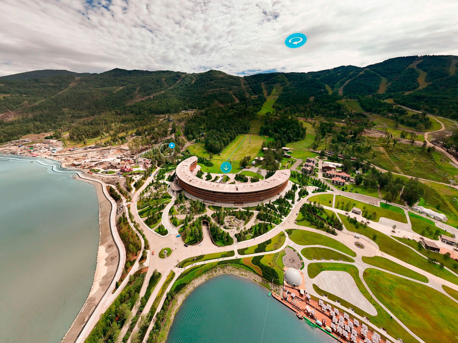 Aerial 360° panorama of a lakeside resort
