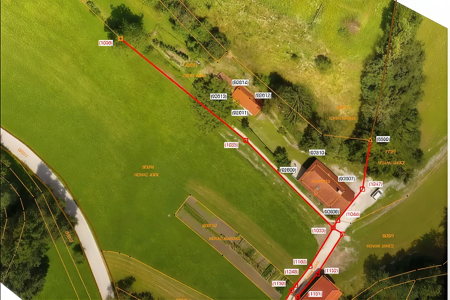 Aerial image of a property with its surveyed boundary lines and boundary points marked
